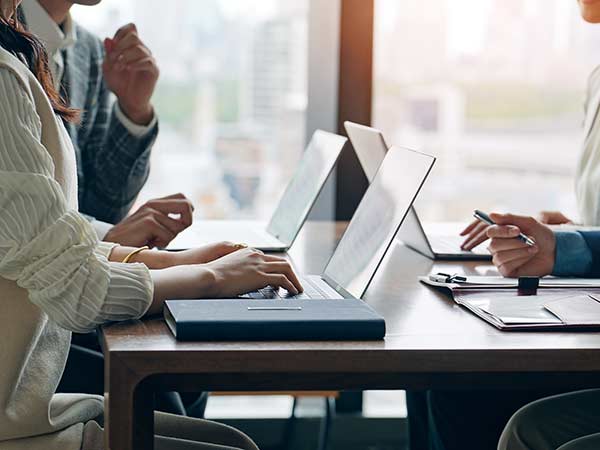 people working on laptops