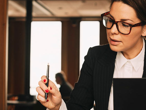 woman looking at documents